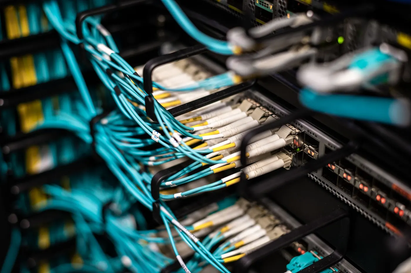 Fibre and network cabling neatly organised in a server rack